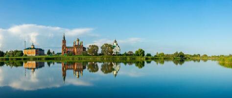 The temple of Nicholas the Wonderworker on the bank of the river... photo