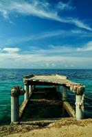 Broken pier of the harbor photo