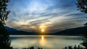 view of the lake at sunrise photo