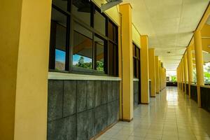 lecture building corridor with yellow walls with a modern design photo