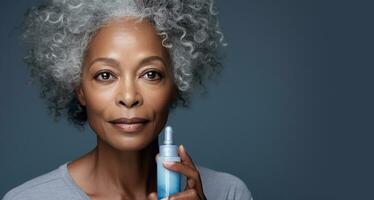 AI Generative Portrait of a mature afro american woman holding serum bottle on a solid background. Anti age cosmetics, black skin, spf, wrinkles photo