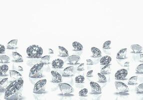 Beautiful Shiny Diamonds in Brilliant Cut on White Background - Crystal Background photo