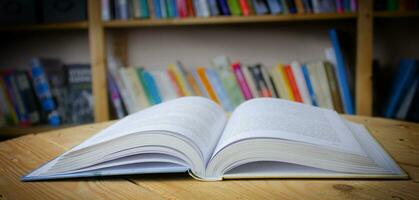 Empty wooden table on library background. Copy space photo