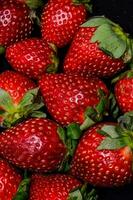 a close up of a bunch of strawberries photo