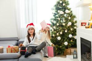 Christmas Happy funny children twins sisters at home photo