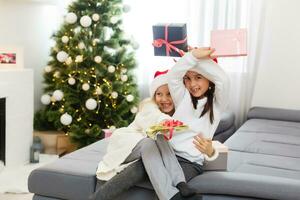 Christmas Happy funny children twins sisters at home photo