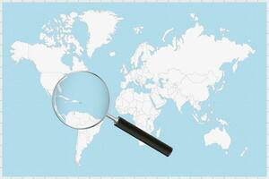 Magnifying glass showing a map of Puerto Rico on a world map. vector