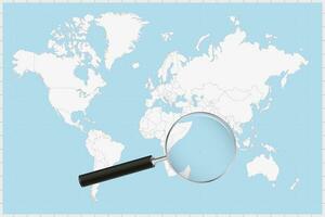 Magnifying glass showing a map of Seychelles on a world map. vector