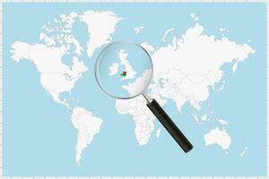 Magnifying glass showing a map of Wales on a world map. vector