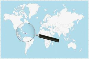 Magnifying glass showing a map of Haiti on a world map. vector