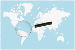 Magnifying glass showing a map of Saint Lucia on a world map. vector