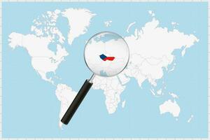 Magnifying glass showing a map of Czech Republic on a world map. vector