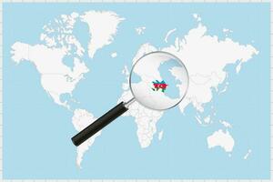 Magnifying glass showing a map of Azerbaijan on a world map. vector