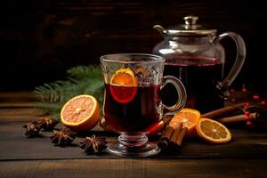 Glass and teapot of mulled wine with slices of oranges, cinnamon and anise on wooden table with fir branch. AI generated photo