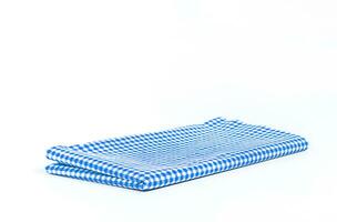 Blue checkered tablecloth isolated on white background photo