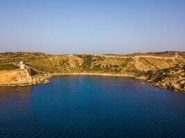 Aerial view on the Malta beach between tower and rocks photo