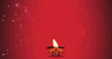geanimeerd beweging grafiek van Hindoe festival rood achtergrond met brandend olie lamp en exploderend voetzoekers in achtergrond met ruimte voor tekst en ontwerp. video