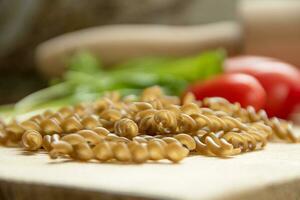 Uncooked gluten free Teff fusili pasta photo