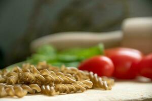 Uncooked gluten free Teff fusili pasta photo