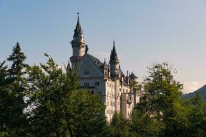 Neuscwanstein castle during spectacular sunset photo