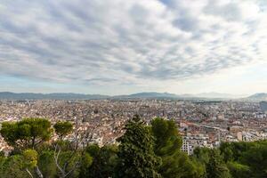 Fluffy clouds over the city photo