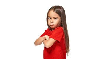 Girl in red t-shirt serious face offended white background photo