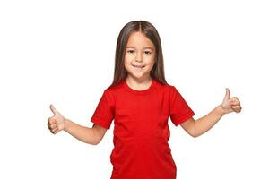Girl in red t-shirt shows her hands with thumbs photo