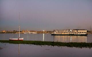 Nile the longest river in Africa. Primary water source of Egypt. Landscape with clear water river. photo