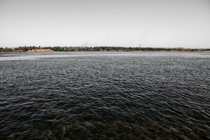 Nile the longest river in Africa. Primary water source of Egypt. Landscape with clear water river. photo