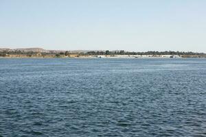 Nile the longest river in Africa. Primary water source of Egypt. Landscape with clear water river. photo