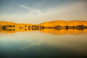 Nile the longest river in Africa. Primary water source of Egypt. Landscape with clear water river. photo