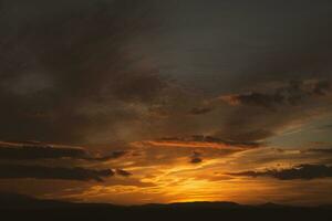 The warm and colorful illumination of the sky during sunset. photo