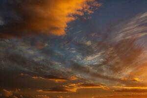 The warm and colorful illumination of the sky during sunset. photo