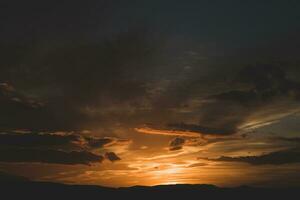 The warm and colorful illumination of the sky during sunset. photo