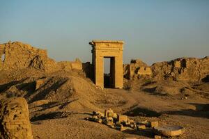 Dendera Temple complex in Egypt. Hieroglypic carvings on wall at the ancient egyptian temple. photo