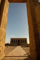 Dendera Temple complex in Egypt. Hieroglypic carvings on wall at the ancient egyptian temple. photo