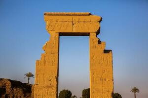 Dendera Temple complex in Egypt. Hieroglypic carvings on wall at the ancient egyptian temple. photo