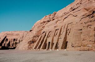 Abu Simbel temple in Egypt. Colossus of The Great Temple of Ramesses II. Africa. photo