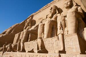 Abu Simbel temple in Egypt. Colossus of The Great Temple of Ramesses II. Africa. photo