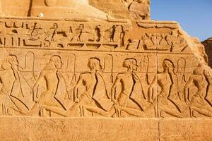 Abu Simbel temple in Egypt. Colossus of The Great Temple of Ramesses II. Africa. photo