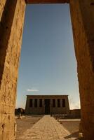 Dendera Temple complex in Egypt. Hieroglypic carvings on wall at the ancient egyptian temple. photo