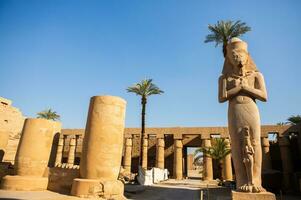 Dendera Temple complex in Egypt. Hieroglypic carvings on wall at the ancient egyptian temple. photo