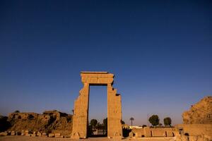 Dendera Temple complex in Egypt. Hieroglypic carvings on wall at the ancient egyptian temple. photo
