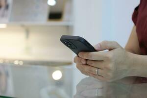 Hand using smartphone, technology concept photo