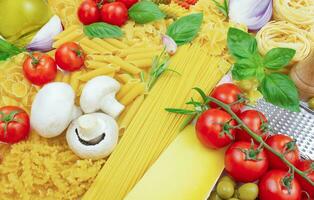 Different types of pasta. Ingredients for making pasta. photo