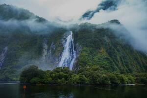 water falls in milford sound fiordland national park southland new zealand photo