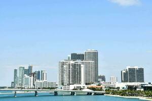 the view of the city from the water in miami photo