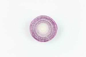 Sliced red onion isolated on white background. Top view. photo
