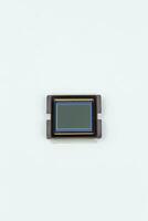 Image sensor inside digital camera, ccd, cmos on white background photo