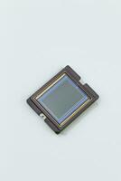 Image sensor inside digital camera, ccd, cmos on white background photo